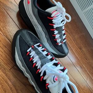 Black and White Sneakers with Red Accents